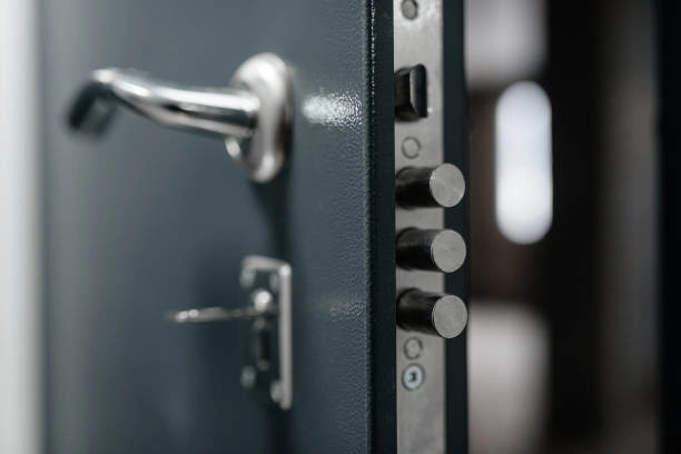 Steel security door with multiple locking bolts and handle. -commercial locksmith services