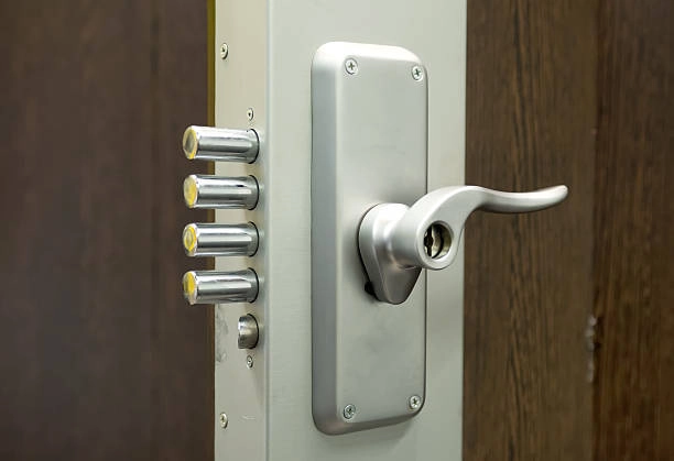 Heavy-duty security door with multiple locking bolts and handle. -commercial locksmith services